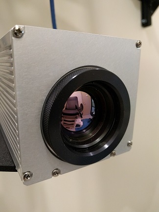 medical chair reflecting in the lens of a camera