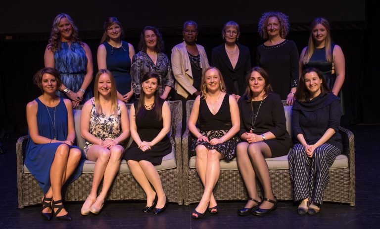Photo of 13 women honoured at the Women of Distinction Awards