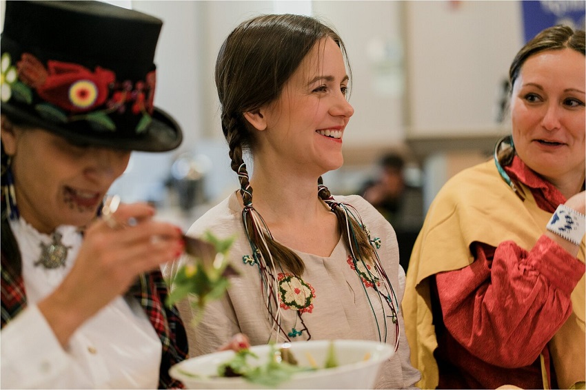 Kim Anderson, Brittany Luby and Sheri Longboat wearing traditional clothing