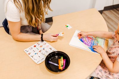 working on an activity with a child