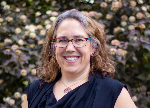 Headshot of Dr. Leah Levac smiling.