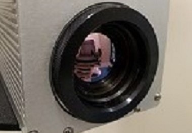 medical chair reflecting in the lens of a camera