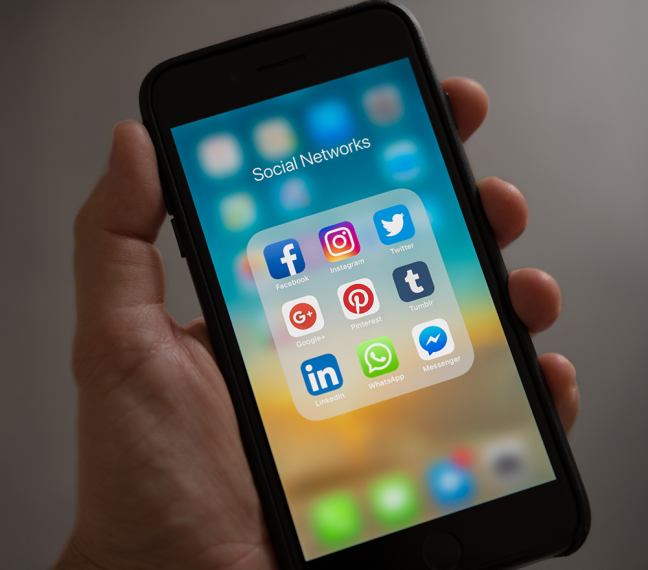 iphone with social media aps showing