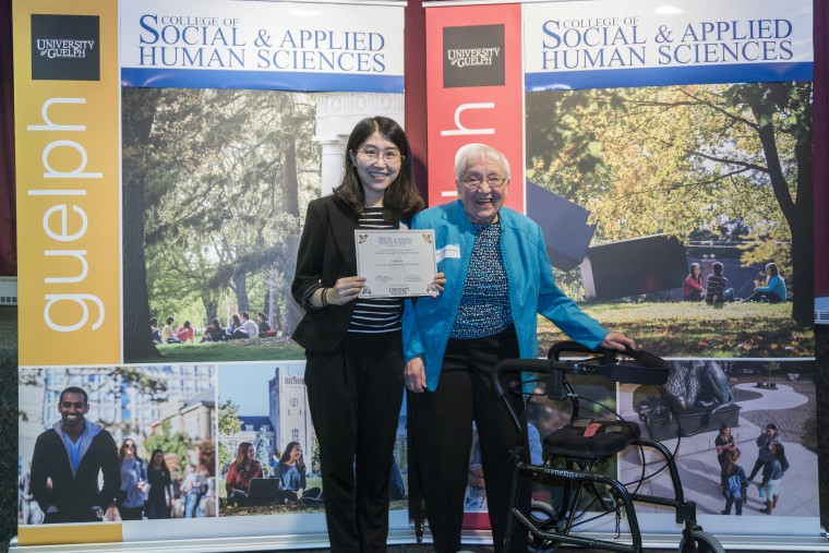 Lila Engberg with scholarship recipient Lihui Liu at CSAHS awards ceremony